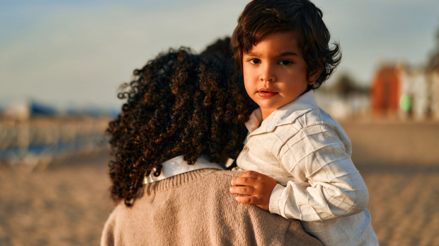 African American family on the beach on the weekend