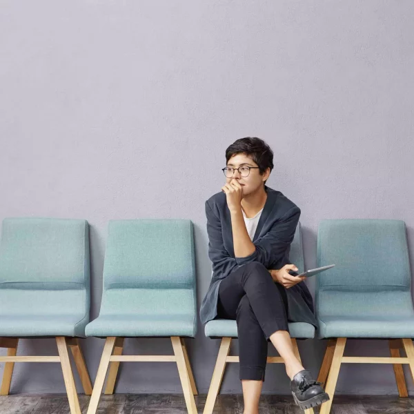 woman waiting for court after delays.