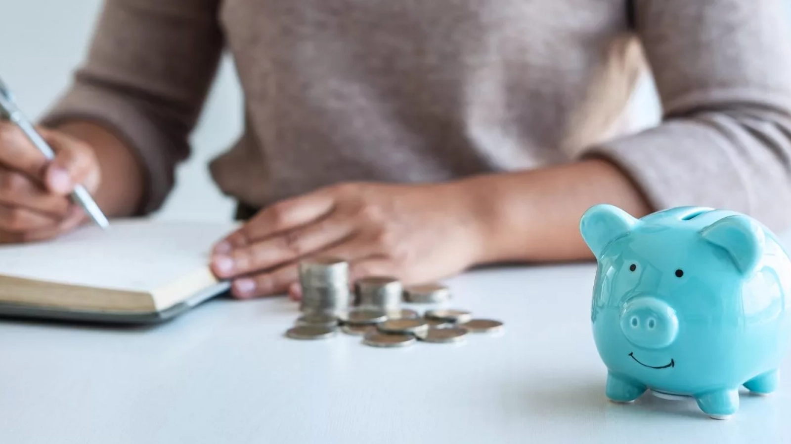 Unmarried couple reviewing financial documents together