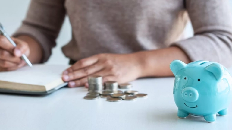 Unmarried couple reviewing financial documents together